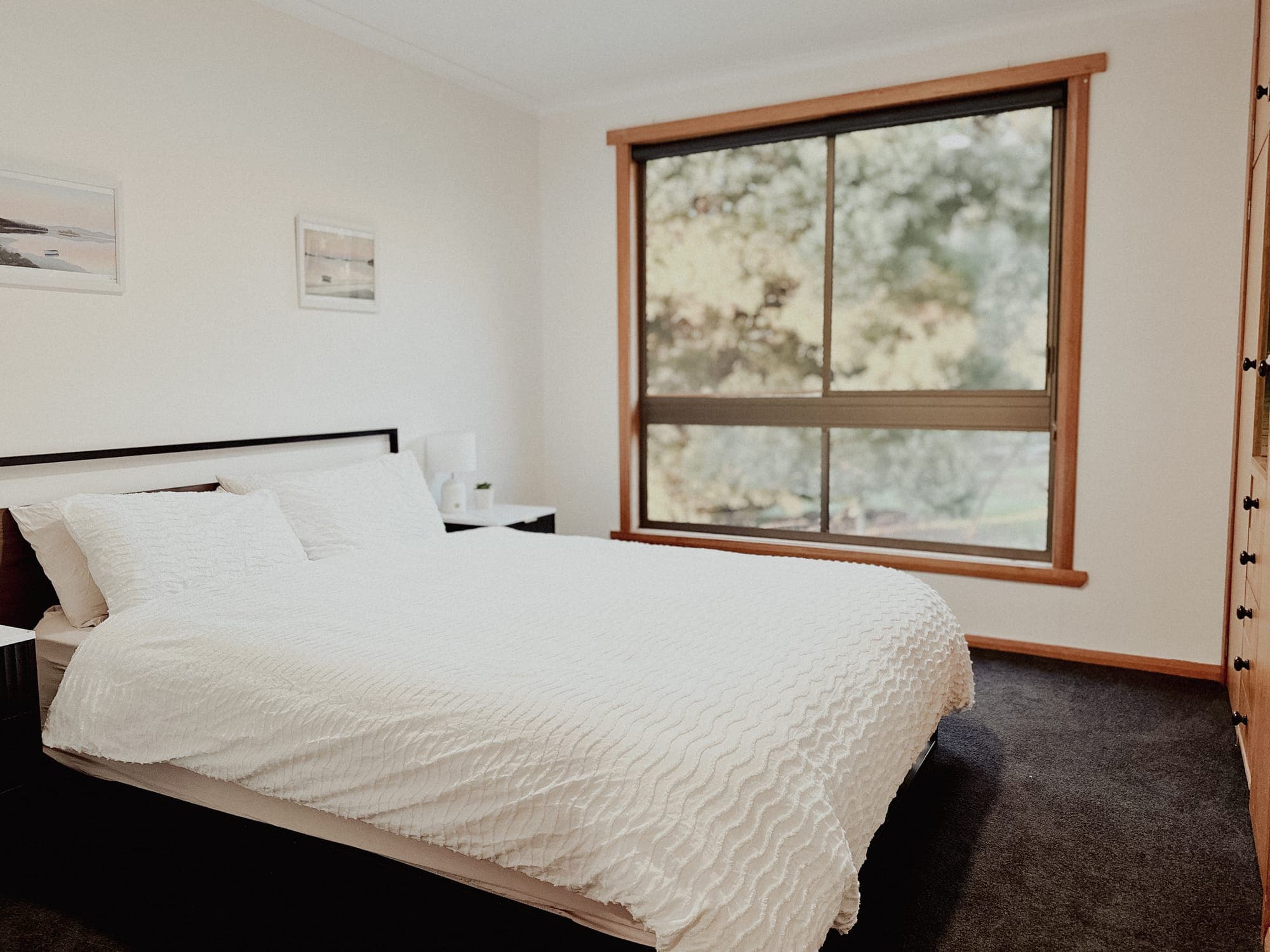 LunaStay — second bedroom with bushland outlook