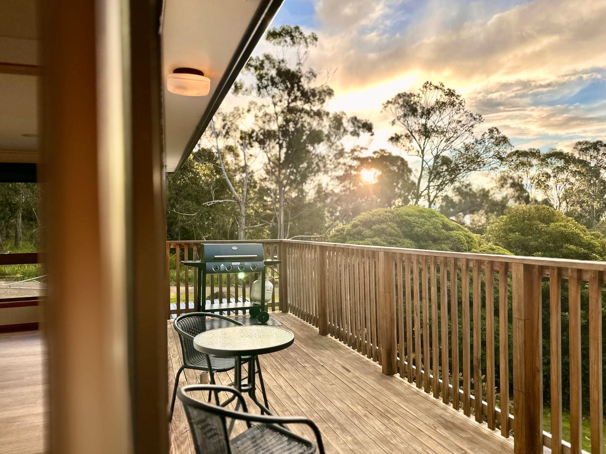 LunaStay — golden evening sky from the deck